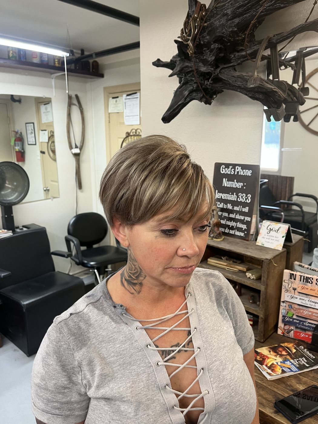 Blonde pixie cut with highlights, cut and coloured at Hair Barn