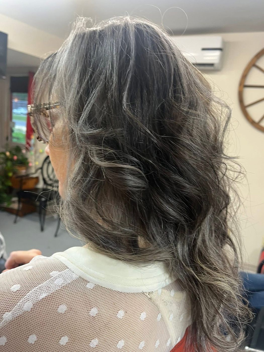 Layered cut with waves, styled at Hair Barn in Tyler, Texas